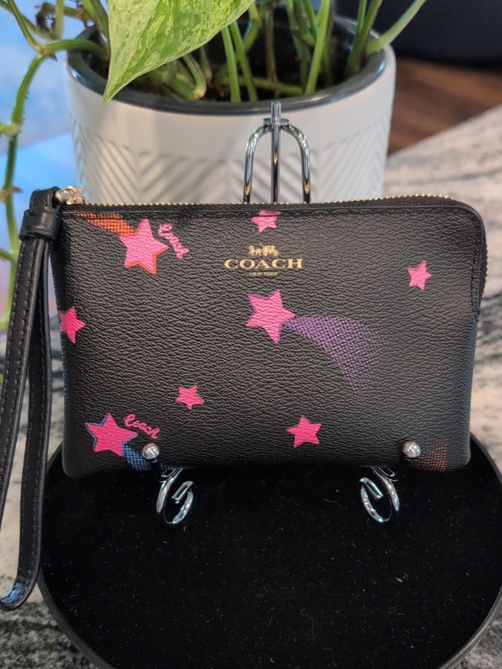 Coach Black Leather Wristlet with Disco Star Print